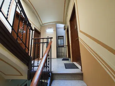a hallway with stairs in a building at Penthouse in Sagrada Familia in Barcelona