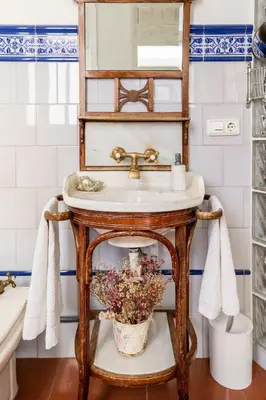 a bathroom with a sink and a mirror at Lovely loft near Barcelona center in Barcelona