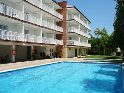a large swimming pool in front of a building at Sunway Torre La Veleta in Sitges