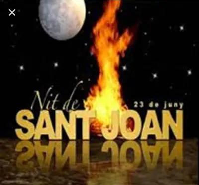 a picture of a moon and fire with the words nmt do sant summon at Apartamento Mar y Montaña in Argentona