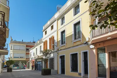 an empty street in a city with buildings at CAL PADRI1871 - 30min to Barcelona, Groups & Families, Beach Stylish House in Premiá de Mar