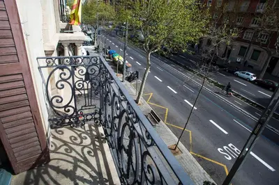 a balcony of a building with a view of a street at Mai & Maud Paralel Apartment in Barcelona