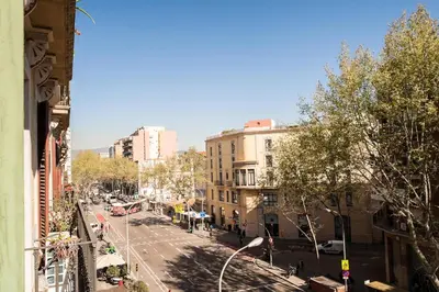 a view of a street in a city with buildings at Mai & Maud Ronda Apartment in Barcelona