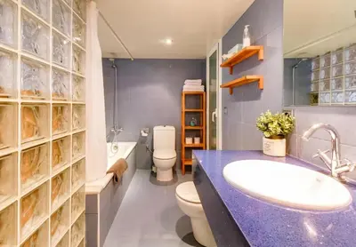 a bathroom with a sink and a toilet at Camp Nou Apartment in Hospitalet de Llobregat