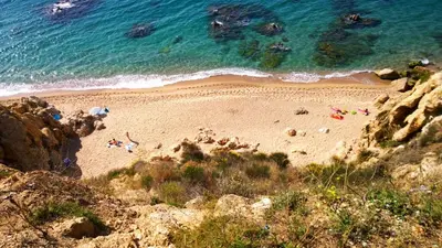 an aerial view of a beach with people on it at Apartment Beach Front Sant Pol in San Pol de Mar