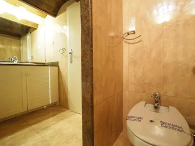 a bathroom with a toilet and a sink at Paseo de Gracia Design in Barcelona