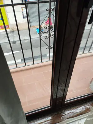 a view of a fire hydrant from a window at Apartment Fira Bcn Camp Nou in Hospitalet de Llobregat