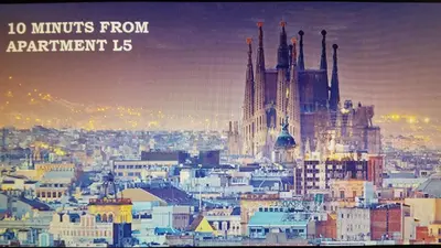 a view of a city at night with the words minutes from apartment at Apartment Fira Bcn Camp Nou in Hospitalet de Llobregat