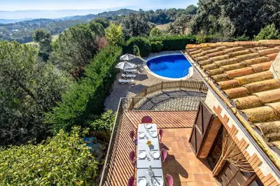 an aerial view of a house with a swimming pool at Catalunya Casas Nature and Tranquility for 24 pax - 30km to beach in Sant Pere de Vilamajor
