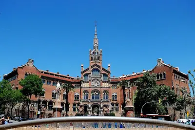 a large brick building with a clock tower on it at David's House in Barcelona