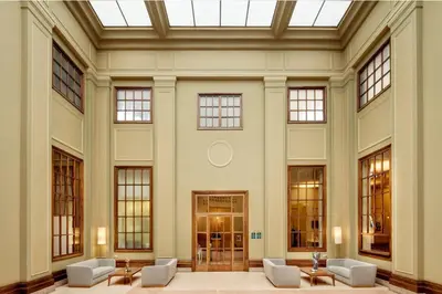 a rendering of the lobby of a building with people at Sercotel Arrahona Sabadell in Sabadell