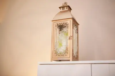 a lantern sitting on top of a white shelf at CasaNova Guest House in Barcelona