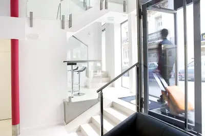 a staircase in a building with a glass window at Live & Dream in Barcelona