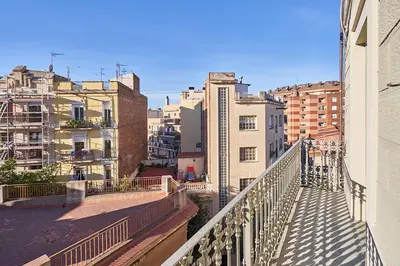 a view of a city from a balcony at Barcelona Sants Station Apartments in Barcelona