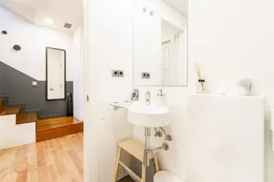 a bathroom with a sink and a toilet at Unique Rentals - Placa Catalunya Central Apartments in Barcelona