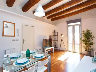 a large living room with a table and chairs at Barcelona Igualada Apartment in Barcelona