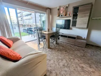 a bathroom with a sink and a tub and a mirror at Spacious apartment in Cabrera de Mar with sea view in Cabrera de Mar