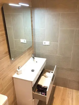 a bathroom with a sink and a mirror at Hip Karma Hostel in Barcelona
