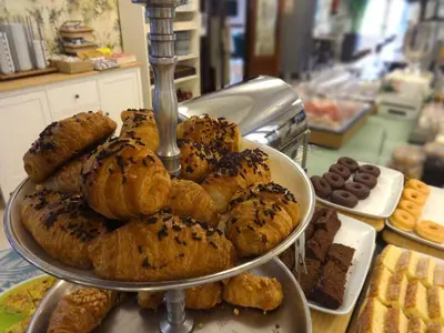 a tray of pastries and cookies on a table at Hotel Lloret Ramblas in Barcelona