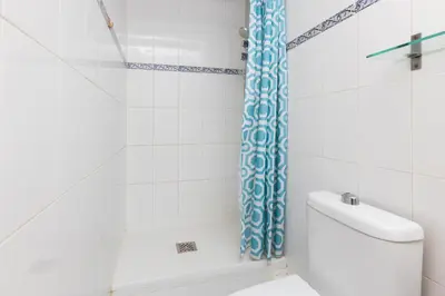 a bathroom with a shower and a toilet at ApartEasy - Central Gracia Apartments in Barcelona
