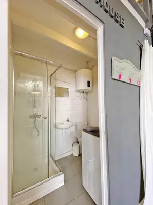 a bathroom with a shower and a toilet at Fridays Flats Casa Lavander in Barcelona