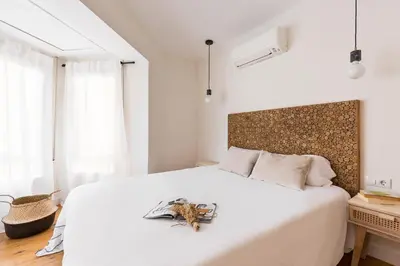 a bedroom with a bed with a spider on it at WOW Apartments by Olala Homes in Hospitalet de Llobregat