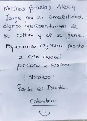 a handwritten note with handwriting on a piece of paper at Hostal Absolut Stay in Barcelona