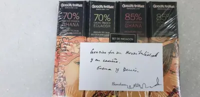 a stack of books with a sign on them at Hostal Absolut Stay in Barcelona