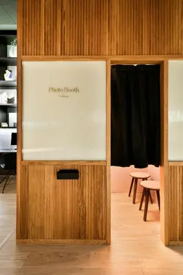 a wooden door with a sign that reads ricochet benefit at Yurbban Passage Hotel & Spa in Barcelona