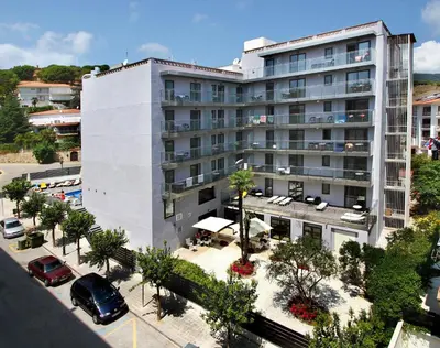 an aerial view of a building with a parking lot at Summer Hotel in Calella
