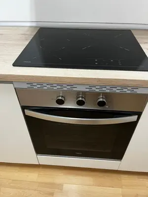 a stove top oven sitting in a kitchen at Centric Apartments Paseo de Gracia in Barcelona