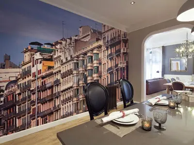 a dining room with a wall mural of buildings at Exclusive apartment for 4 people in characteristic area of Barcelona in Barcelona