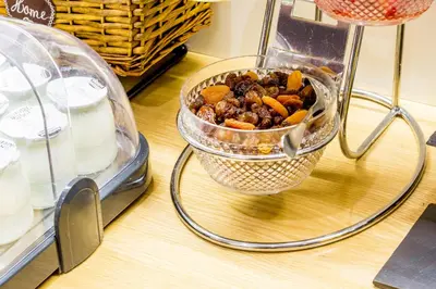 a container of food sitting on a table at Apart-Suites Hostemplo in Barcelona