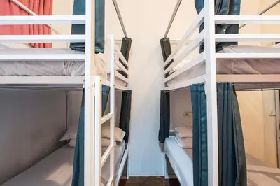 a room with bunk beds in a dorm room at Safestay Barcelona Gothic in Barcelona