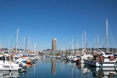 a bunch of boats are docked in a marina at New Hotel Colon in Mataró
