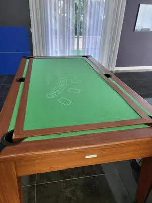 a table with a green playing field on it at Luxurious Villa Marly II piscina climatizada in Castelldefels