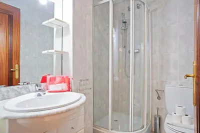 a bathroom with a sink and a shower at Alcam El Coll in Barcelona