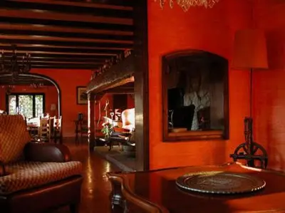 a living room with a couch and a table at Masia Vista Hermosa in Vallromanas