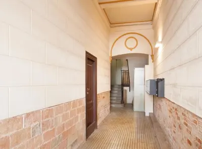an empty hallway in a building with a door at Pere IV · New & modern apartment close to beach in Barcelona