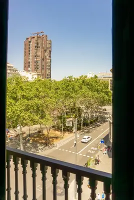 a view of a city street from a balcony at Fontanella Green House in Barcelona