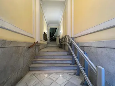 a stairway in a building with stairs and a hallway at Stay Unique Apartments Cent in Barcelona