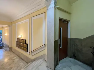 a hallway with a large window in a building at Stay Unique Apartments Cent in Barcelona