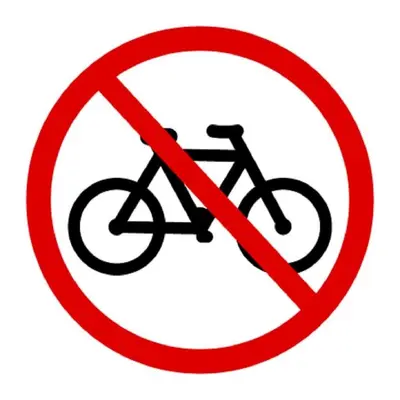 a red prohibitory sign with a bike in it at Hostal Las Flores Ramblas in Barcelona