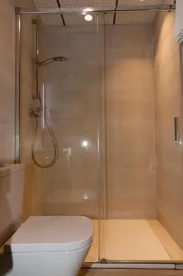 a bathroom with a shower and a toilet at Hostal Paris in Barcelona