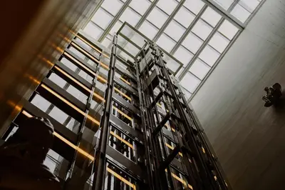 a tall building with windows in a building at Hotel Arconte, Adults Only in Barcelona