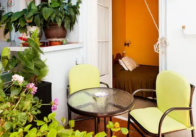 a small room with a table and chairs at Hostal del Palau in Barcelona