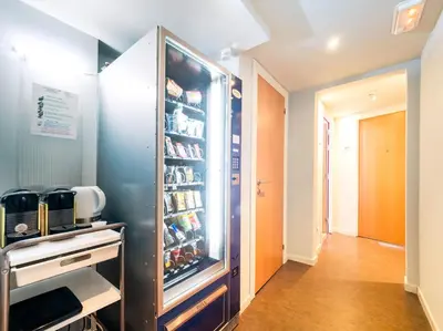 a large refrigerator with food inside of it at Hostal Athenas in Sant Adria de Besos