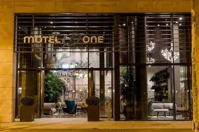 a store front with the entrance to a metelli one store at Motel One Barcelona-Ciutadella in Barcelona