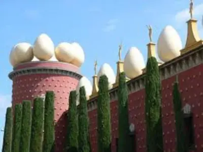 a building with domes on top of a cactus at Oasis Near Barcelona Pool Tennis Beach in Sant Andreu de Llavaneres