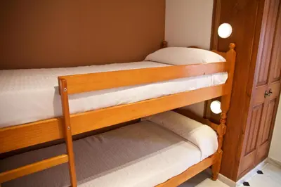 two bunk beds in a small room with at Casa Pintor in Sant Sadurní dʼAnoia
